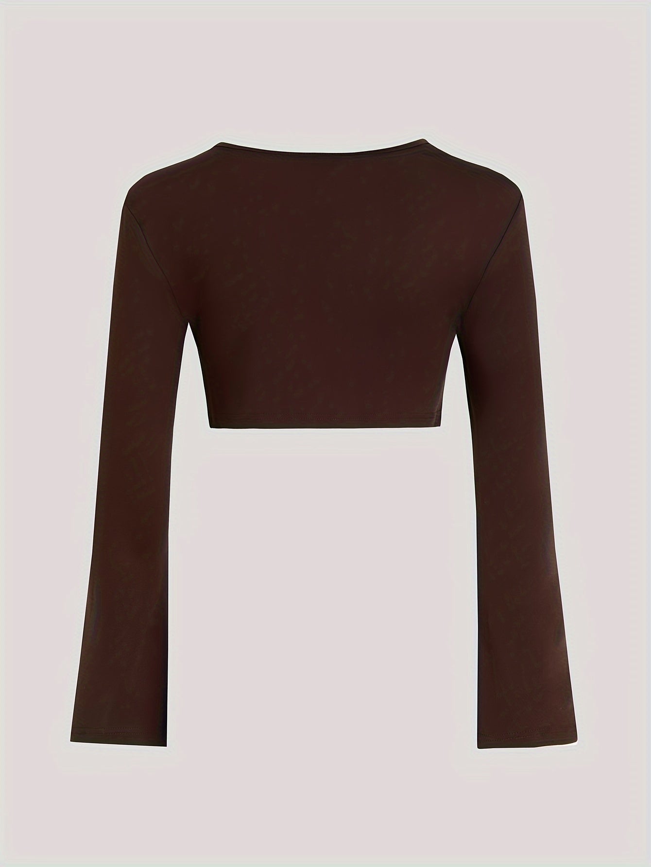 A Two-Piece Set Featuring a Short Crop Top with Long Sleeves And a Fitted Waistline Dress, Perfect for Spring And Autumn